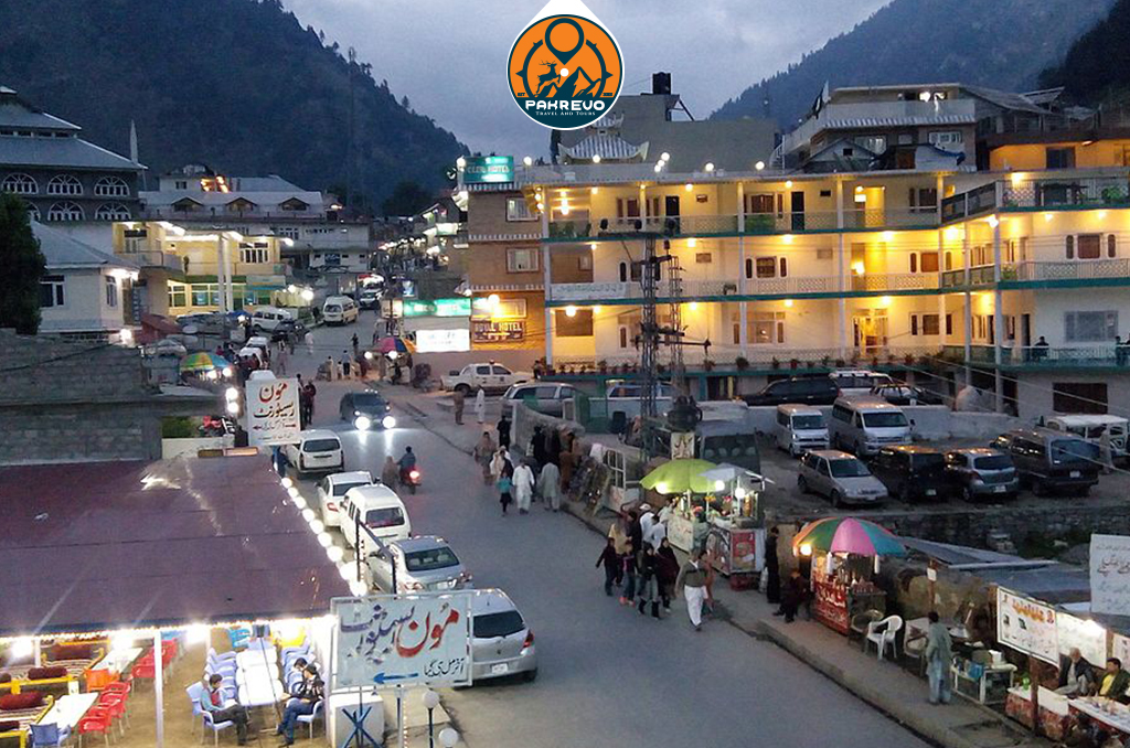 Evening scene at Naran Bazaar with tourists and local shops
