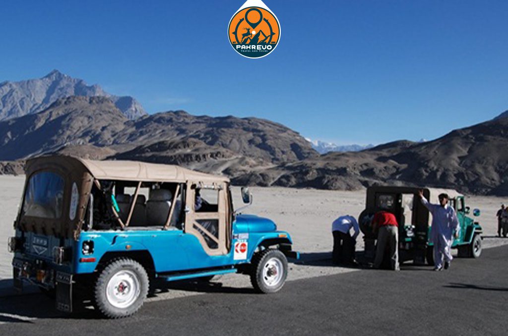Jeep convoy traversing the vast Deosai Plains landscape