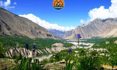 Group of tourists photographing Attabad Lake in Hunza Valley