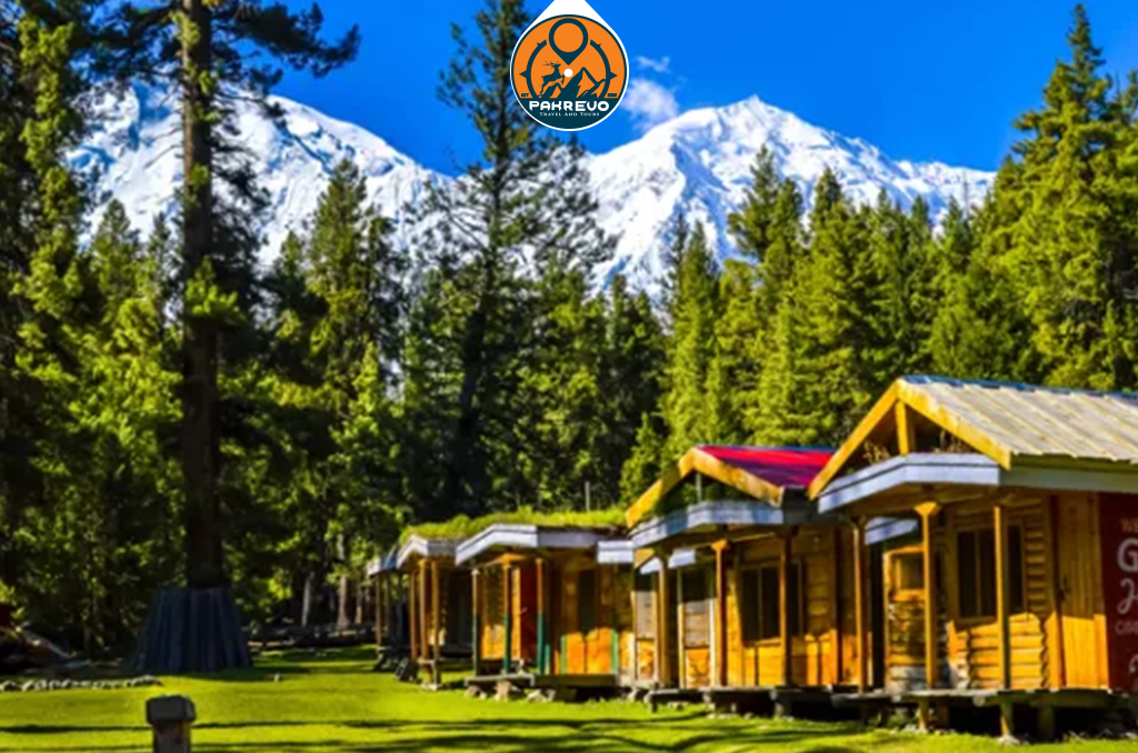 Newlyweds walking across the Lover’s Bridge at Fairy Meadows