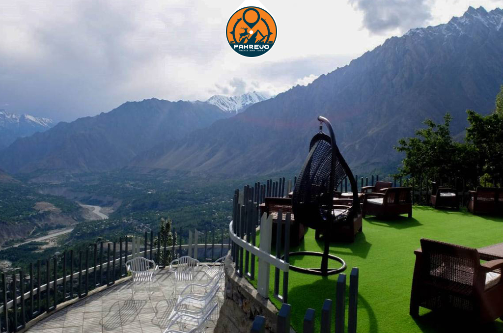 Couple watching sunrise from Eagle’s Nest viewpoint in Hunza