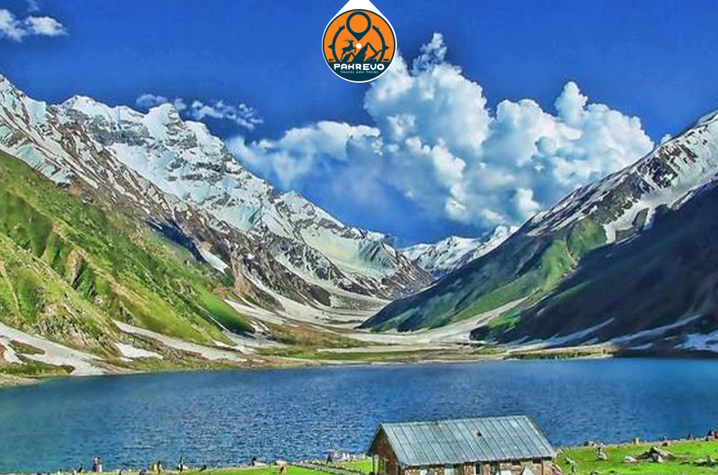 Couple enjoying sunset by Saif‑ul‑Muluk Lake in Naran Kaghan