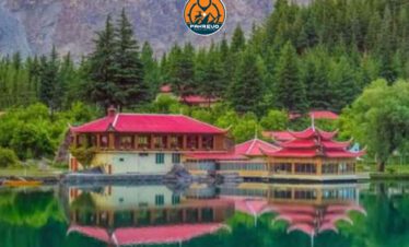 Couple dining lakeside at Shangrila Resort, Skardu