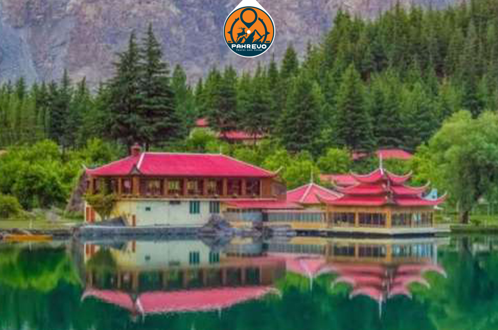 Couple dining lakeside at Shangrila Resort, Skardu