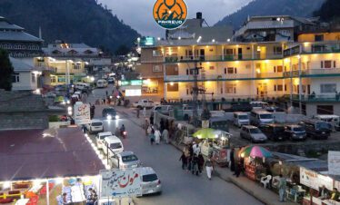 Saif-ul-Muluk Lake surrounded by mountains – part of Naran Kaghan travel plan