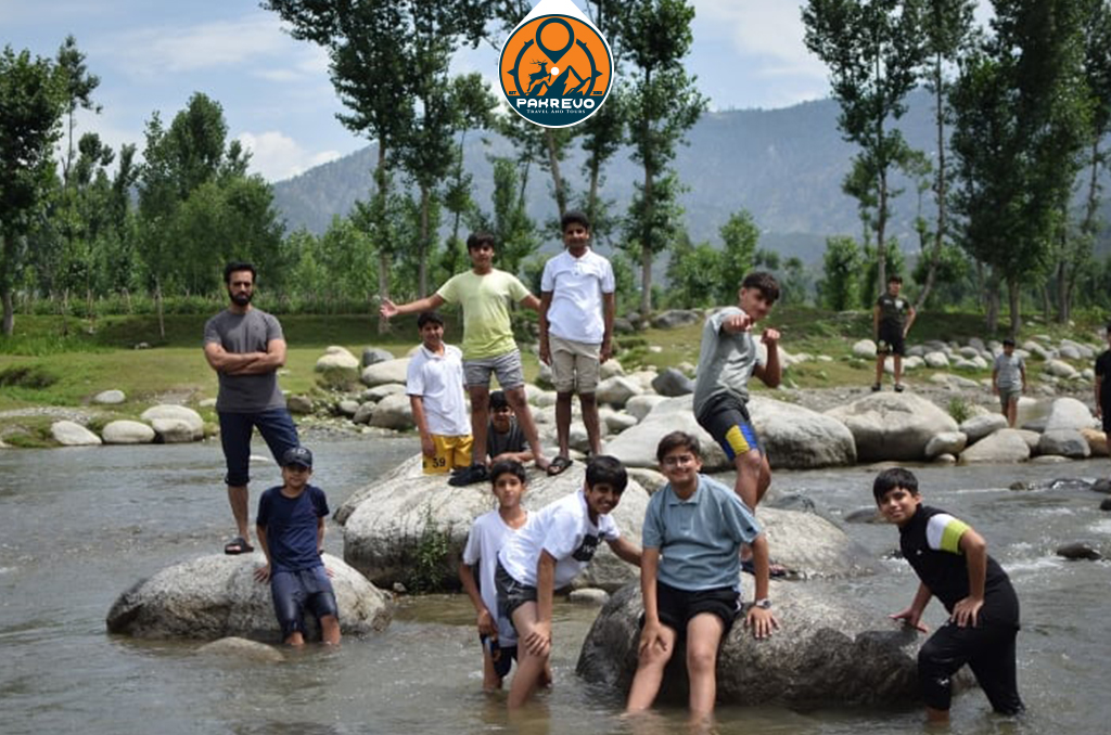 Group of young campers hiking the Shogran to Siri Paye trail