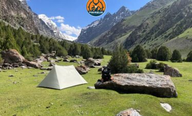 Colorful tents set up for a youth camp in Siran Valley pine forest