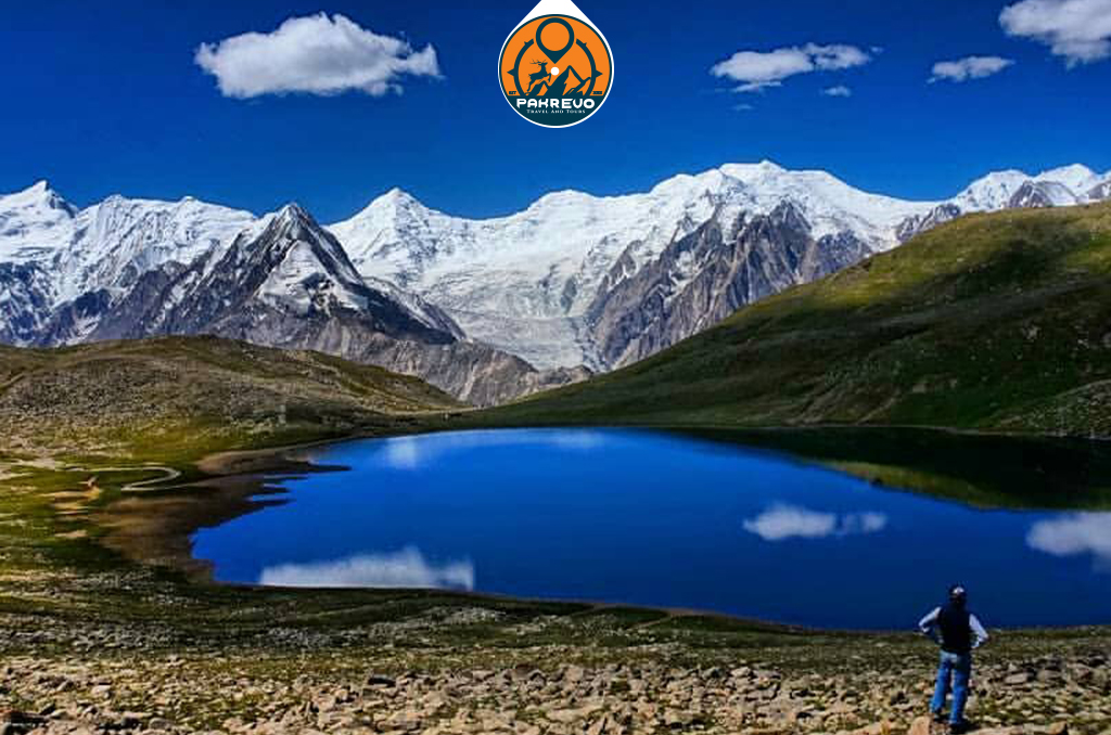 Young trekkers crossing alpine meadows en route to Rush Lake