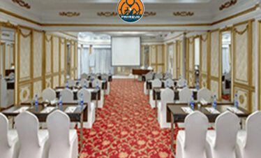 Formal meeting in a plush conference hall with Bhurban hill views