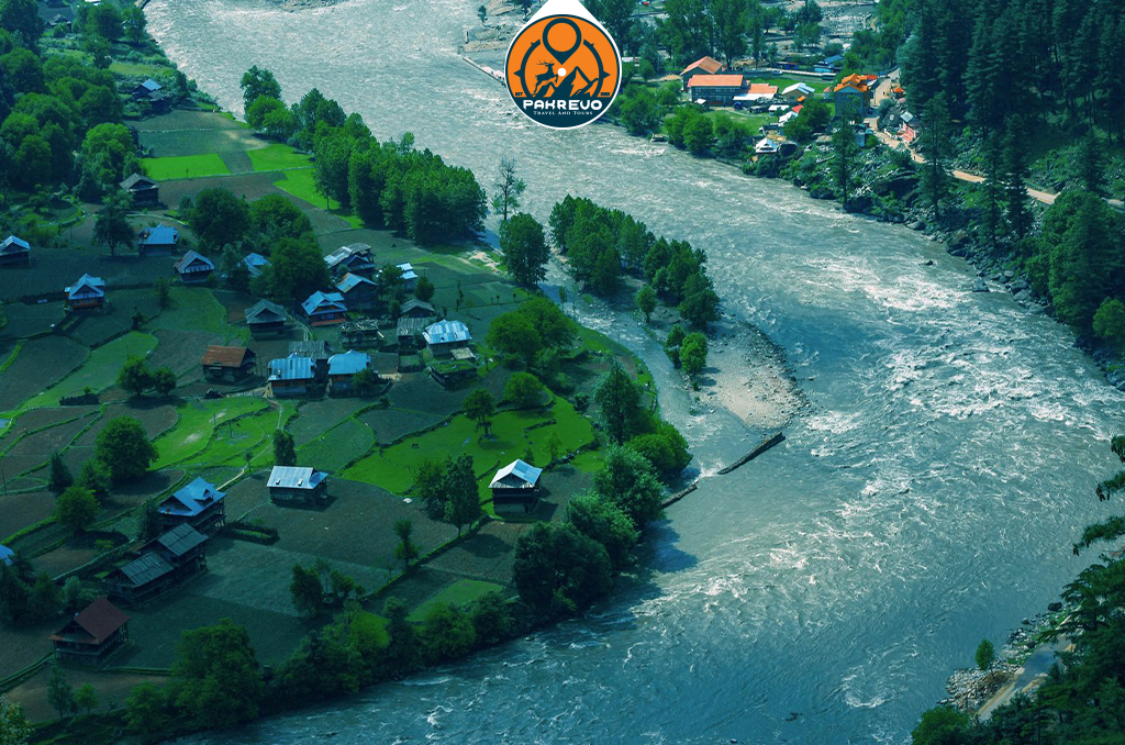 Camping setup in Neelum Valley near riverbanks and pine-covered hills