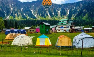 Neelum Valley green meadows and riverside landscapes surrounded by forested hills