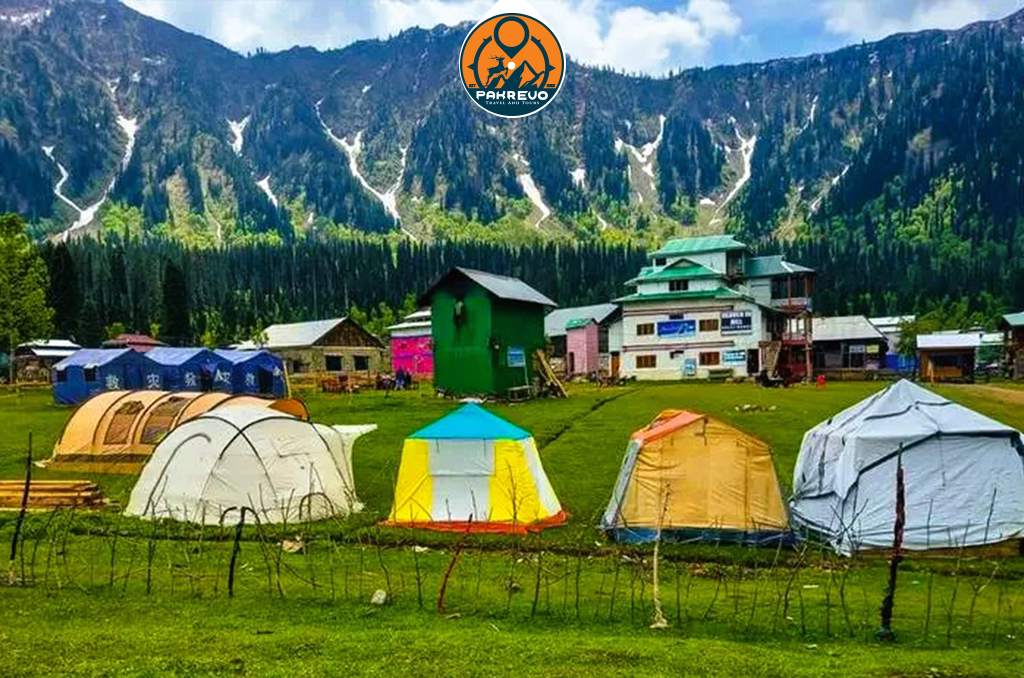 Neelum Valley green meadows and riverside landscapes surrounded by forested hills