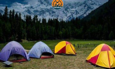 Group of students camping under the stars at Fairy Meadows