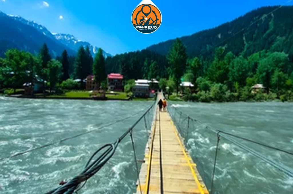Students crossing a suspension bridge over Neelum River
