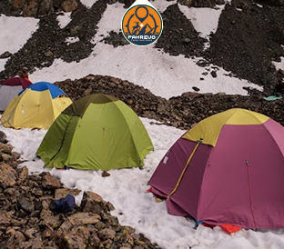 Night camping with bonfire under the stars in Pakistan’s north