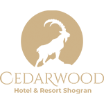 Cedarwood Hotel & Resort in Shogran surrounded by pine forests and lush green hills with mountain views