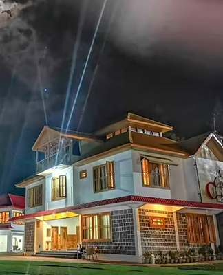 Chinar Resorts in Sharan Forest offering wooden cabins, serene pine forest views, and a peaceful mountain retreat