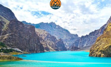 Verdant Hunza and Skardu meadows with Karakoram peaks and spring blossoms