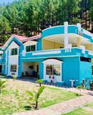 Summer Land Guest House and Resort in Siran Valley offering family-friendly stays with lush gardens and mountain views