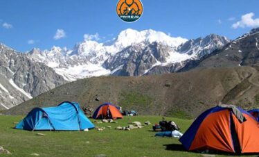 Trekking team setting up camp at Rakaposhi Base Camp